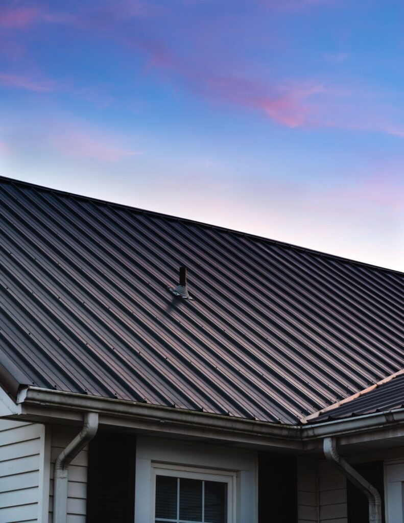 a beautiful house metal roof during the sunset 2026 03 09 02 54 29 utc Large