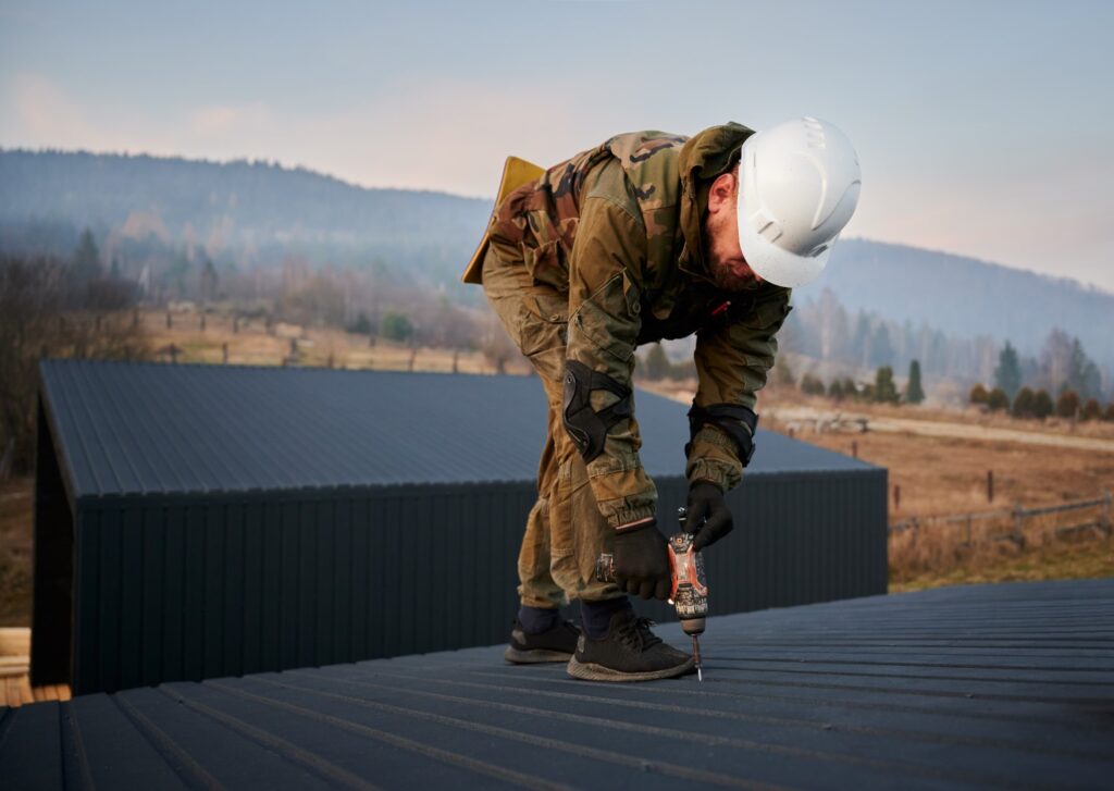 builder installing corrugated iron sheet used as f 2026 01 07 00 59 00 utc Large