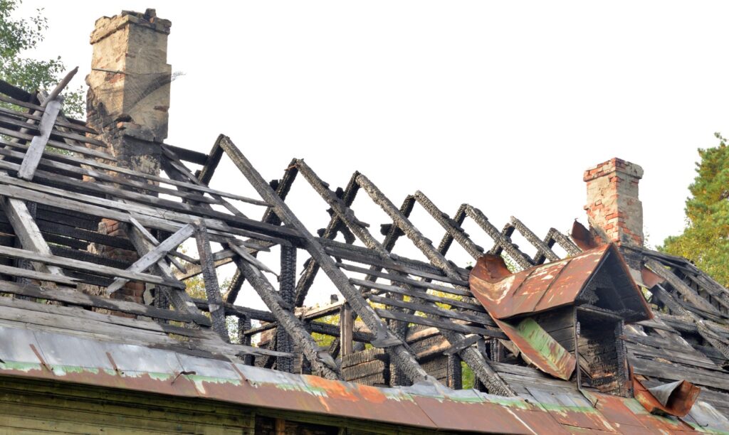 burned down rustic wooden house after the fire 2026 01 11 08 18 55 utc Large