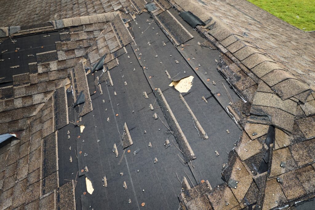 damaged house roof with missing shingles after hur 2026 01 07 02 06 26 utc Large