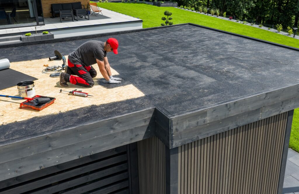 worker installing epdm roofing material on a resid 2026 01 09 11 23 59 utc Large